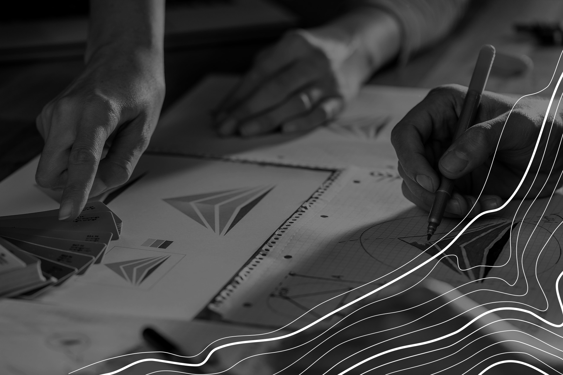 4B Designers working on a rebrand