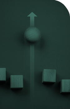 wood ball rolling past wood squares