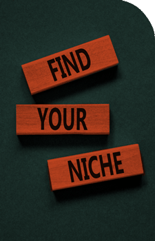 Find Your Niche words on three wood blocks